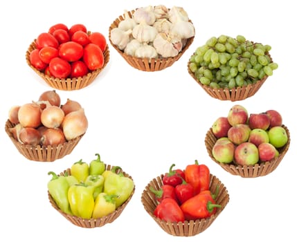 tomato, onion, garlic, peppers, apples and grapes on a white background