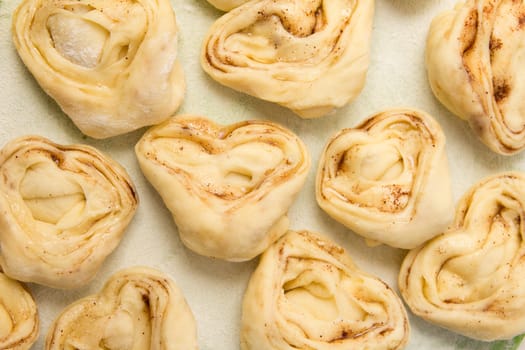 Half-finished product of a roll with cinnamon
