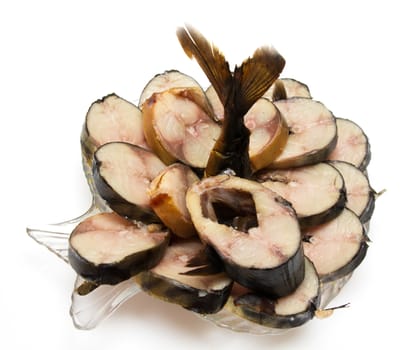 Smoked mackerel in a plate on a white background 