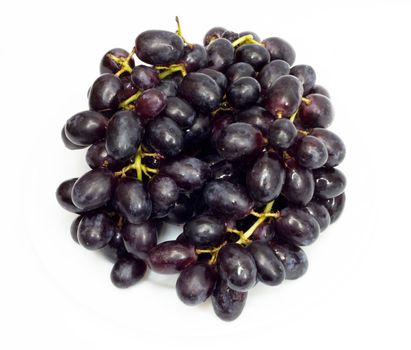 Bunch of black grapes isolated on white background 