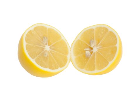 Two fresh lemon halves on white background. 