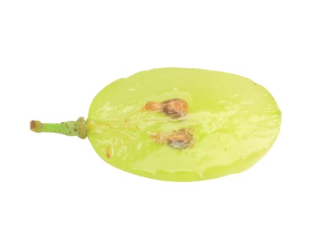 Translucent slice of green grape fruit, macro isolated on white 