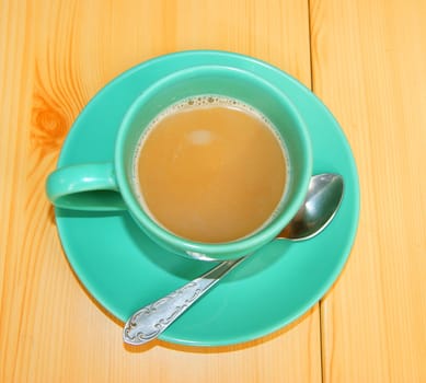 Cup hot coffee on table