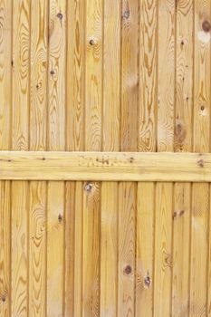 Close up of gray wooden fence panels 