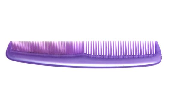 pink comb on a white background