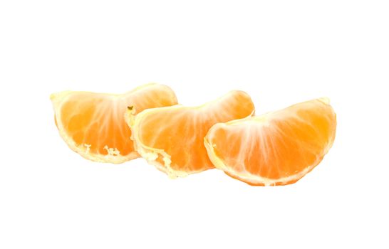 Slices of peeled orange on white background 
