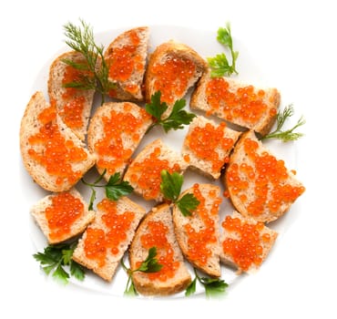 red caviar on bread with parsley