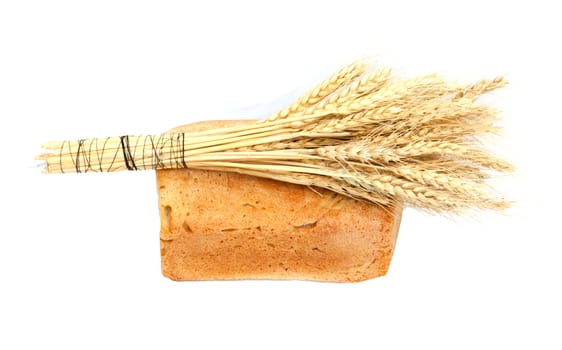 Bread and wheat on a white background 