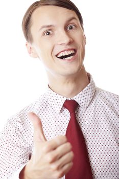 Happy businessman with thumb up on a white background