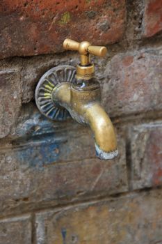 Old bronze water tap