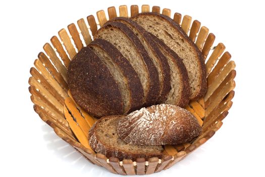 Black bread on board on white background 
