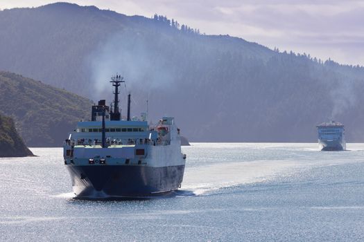 Huge car ferry ships in calm water of Marlborough Sounds South Island New Zealand