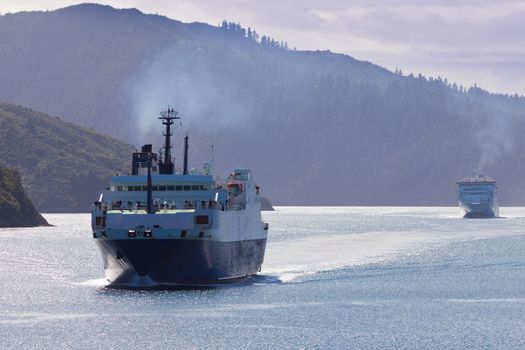 Huge car ferry ships in calm water of Marlborough Sounds  South Island  New Zealand