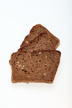 Slices of dark bread isolated over white 