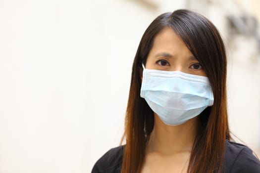 Asian woman wearing face mask