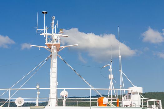 Navigation system  and Ships antenna in a clear blue sky