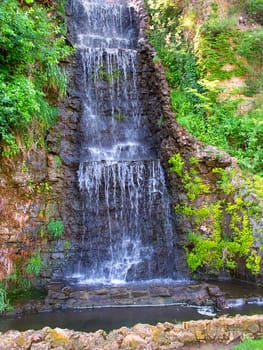 Beautiful waterfall flowing at Krape Park in northern Illinois.