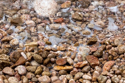 Beautiful Pebble stones at the sea