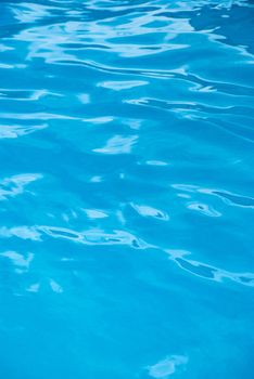 Silky deep blue pool water reflectinng natural light