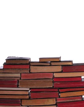 wall of old books with aged pages