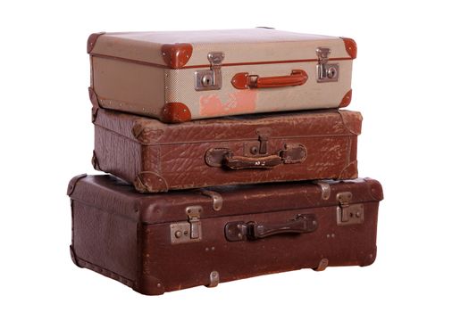 stack of aged suitcases