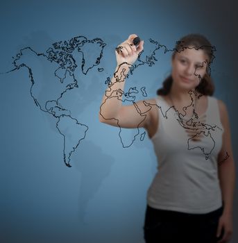 businesswoman drawing the world map in a whiteboard