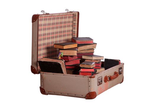 very old suitcase stuffed with old books