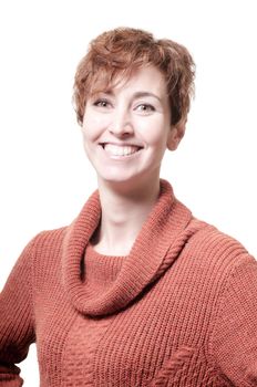 smiling short hair girl cold with orange sweater on white background