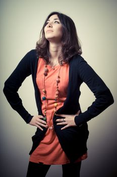 beautiful fashion hipster girl on gray background