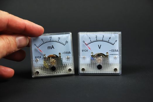 Stock pictures of traditional and analog electrical meters