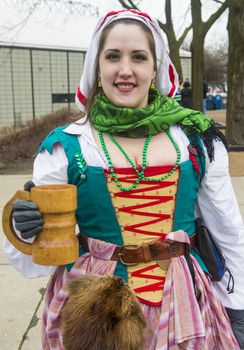 CHICAGO - MARCH 16 : A woman with a Renaissance costume before Participating in the annual Saint Patrick's Day Parade in Chicago on March 16 2013