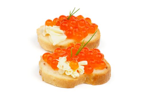 Two Delicious Red Caviar Snacks with Butter, Spring Onion and Baguette isolated on white background