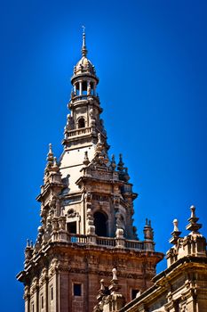 Top of cathedral in Spain against the clear blue sky