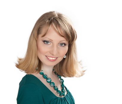 beauty portrait of a blonde in a green dress isolated on white background