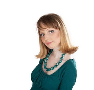 beauty portrait of a blonde in a green dress isolated on white background