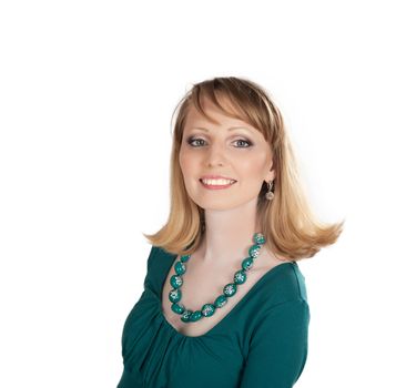 beauty portrait of a blonde in a green dress isolated on white background