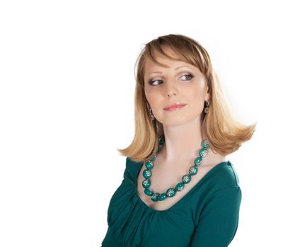 beauty portrait of a blonde in a green dress isolated on white background