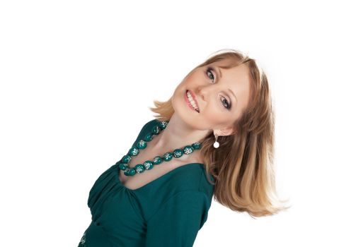 beauty portrait of a blonde in a green dress isolated on white background