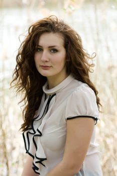 Portrait of a young attractive girl in warm tones