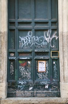 Graffiti art on doors in Rome street