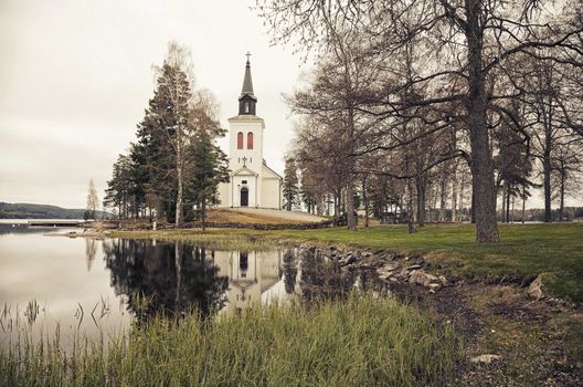 The beautiful Faagelvik Church - Varmland, Sweden situated right down to a tranquil  lake.
