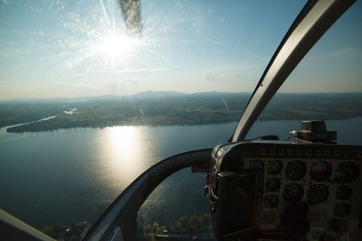 Aerial photography from a helicopter cockpit