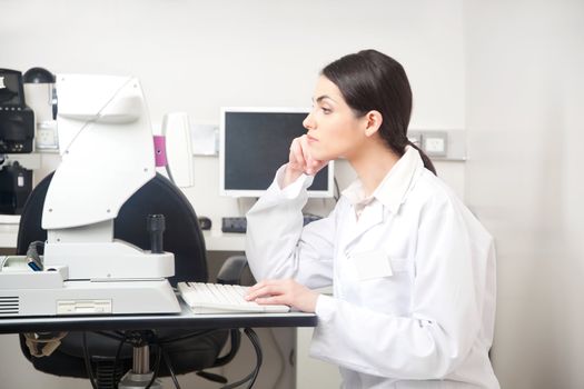 Portrait of female optometrist in clinic.