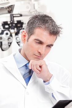 Portrait of doctor in ophthalmology clinic.