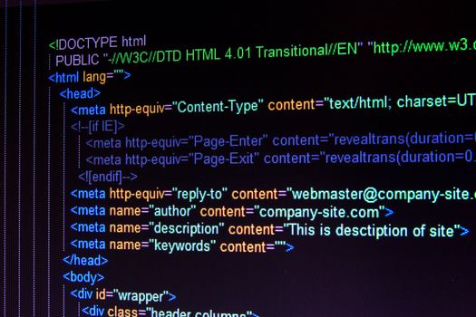 Code of HTML language on black LCD screen