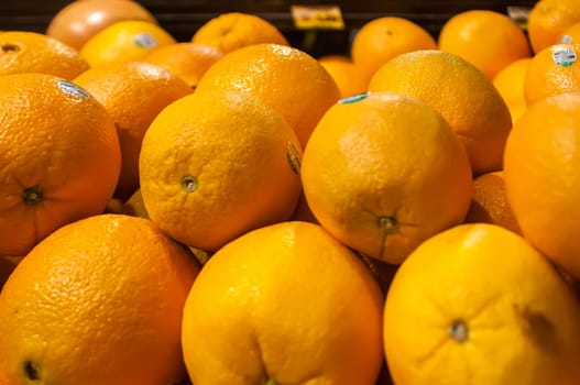 oranges on display at farmers market