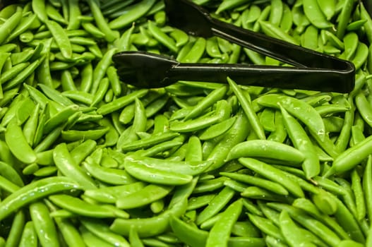 Freshly harvested peas on display at the farmers market