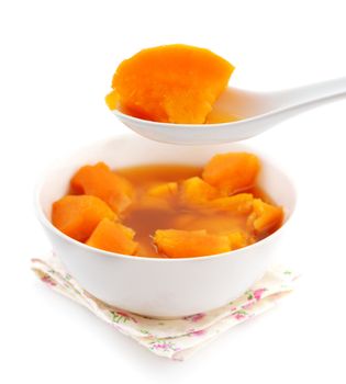 Bowl of sweet potato soup. Asian style dessert soup. Cooked with brown rock candy and ginger.