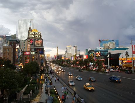 LAS VEGAS - SEPTEMBER 25: Traffic travels along the Las Vegas strip on September 25, 2011 in Las Vegas. The strip is approximately 4.2 mi (6.8 km) long.