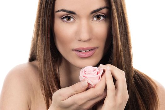 Cute woman with pink rose on white background